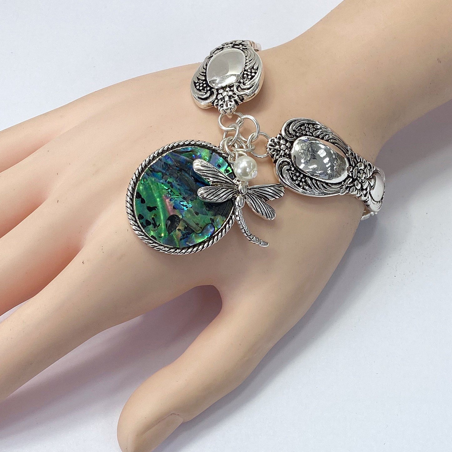 B0162 BB00440 Mother of Pearl Accented Dragonfly Shape Charms Bracelet