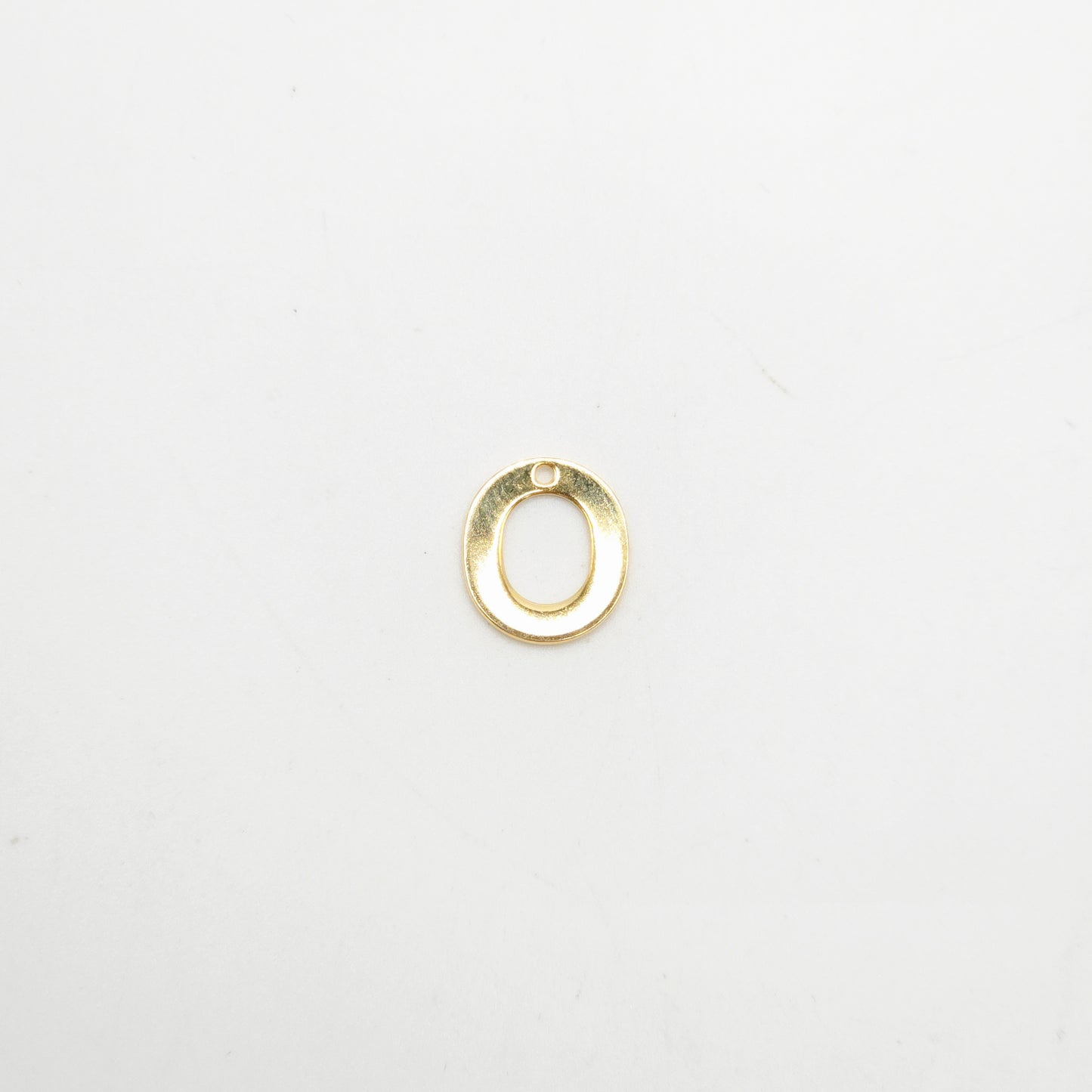 Gold ring on a white background