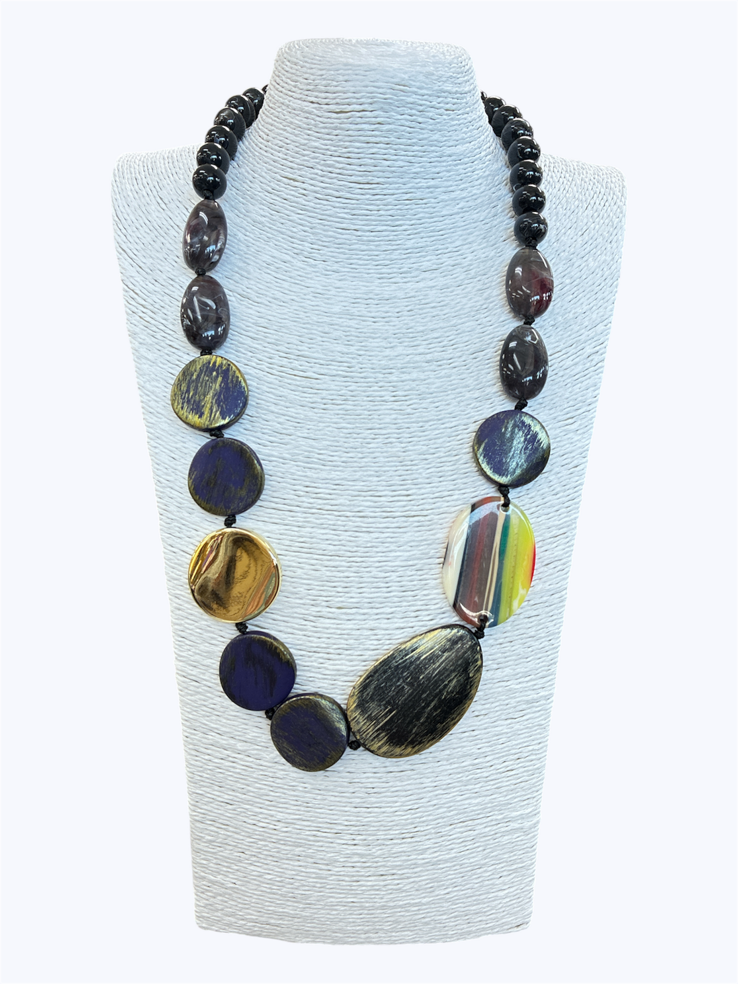 Navy statement bead necklace with glossy marbled and metallic resin accents for a chic modern boutique statement style.