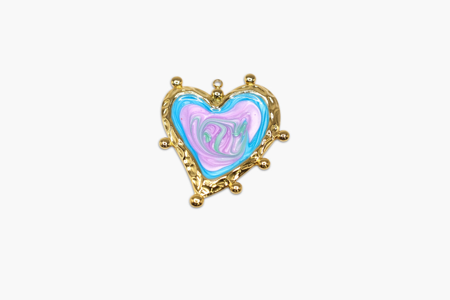 Heart-shaped pendant with gold frame and colorful interior on a white background
