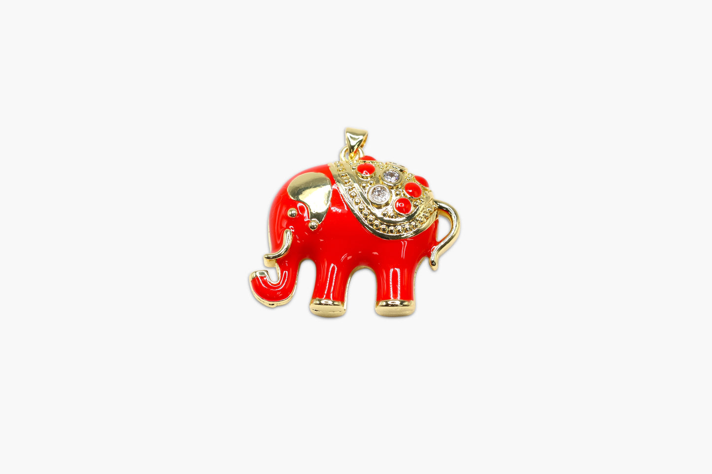 Red elephant pendant with gold accents on a white background