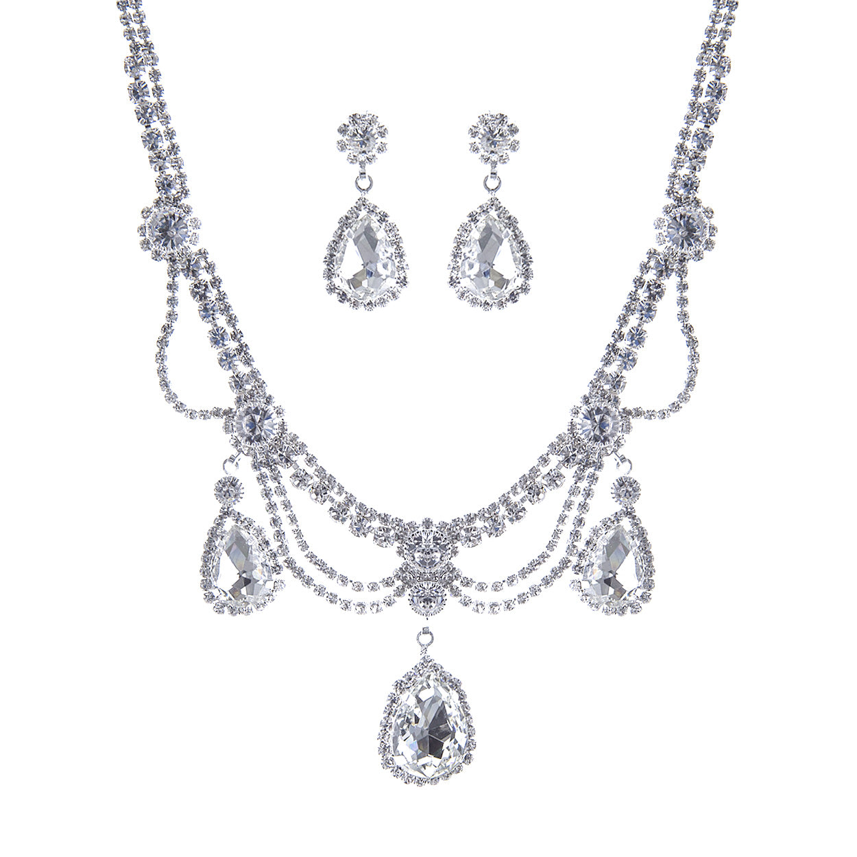 Silver necklace and earrings set on a white background