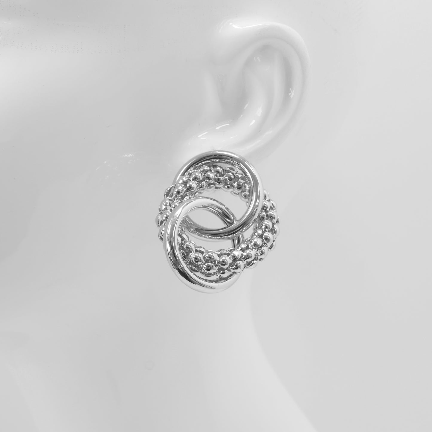 E0001 | Interlocking Knot Stud Earrings | 28580