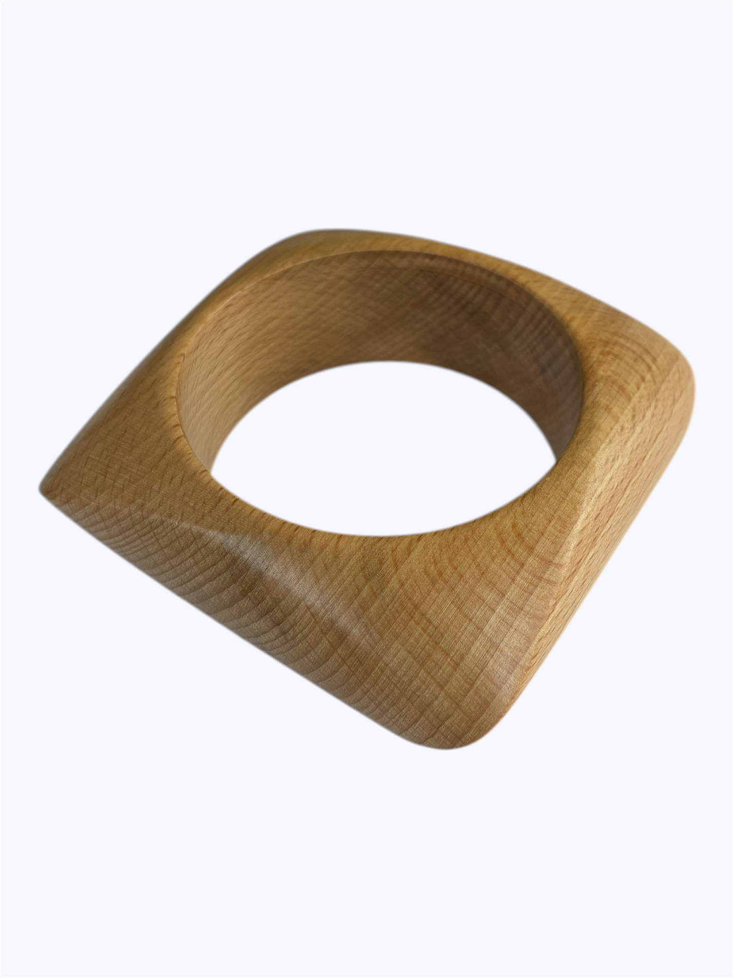 Beige geometric cutout earrings with an organic square silhouette and minimalist contemporary style