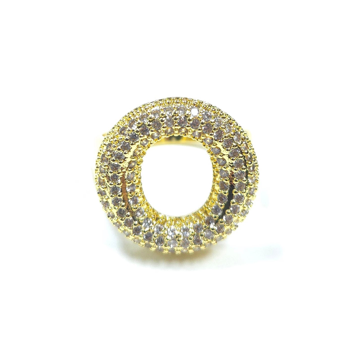 Gold ring with embedded stones on a white background