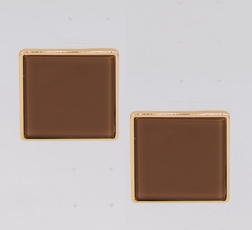 Pair of square earrings with gold rims on a light gray background