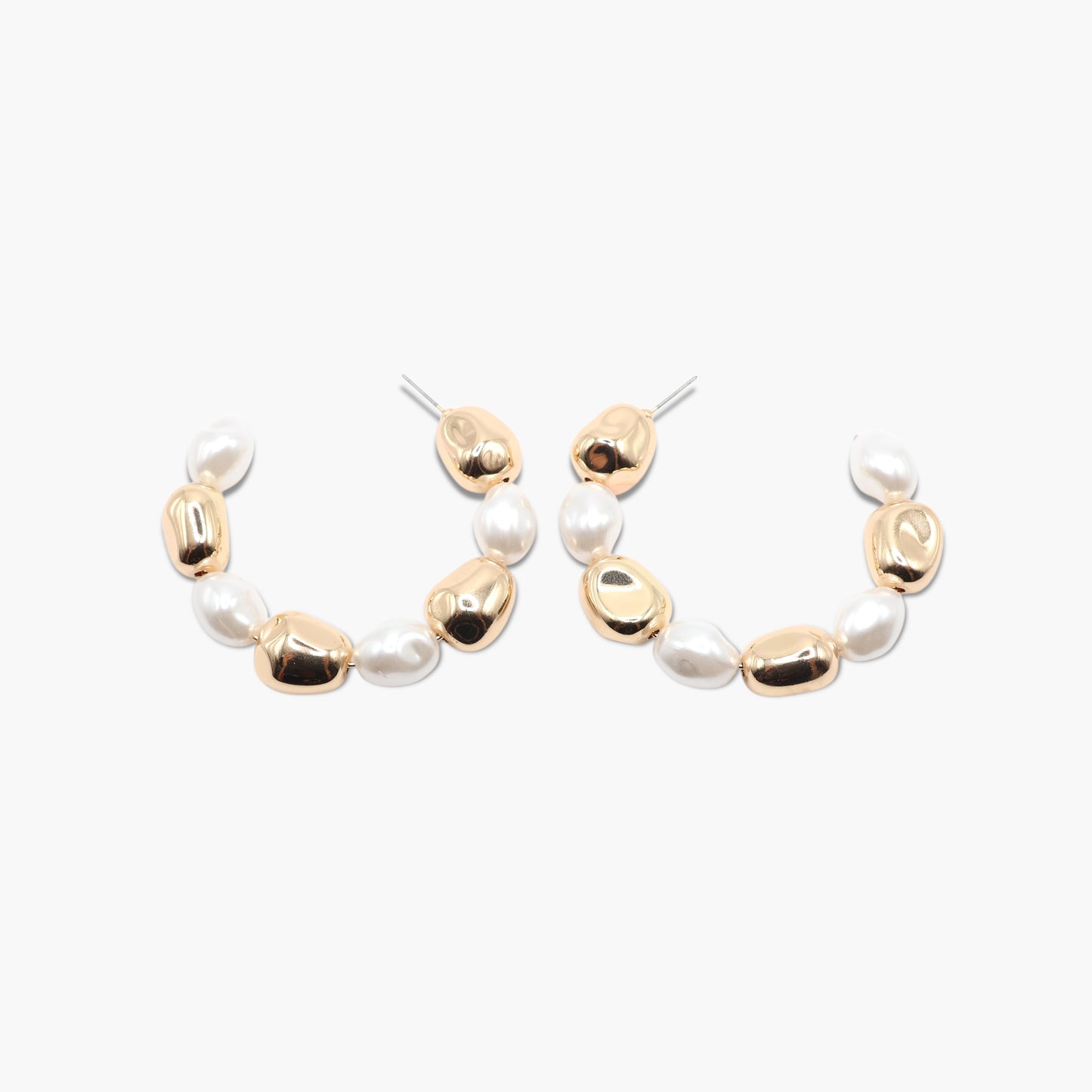 A pair of gold-colored hoop earrings with white pearl accents.