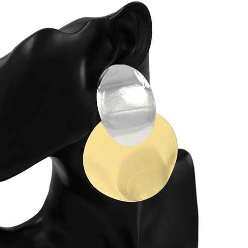 Gold and silver round earring on a black mannequin ear.