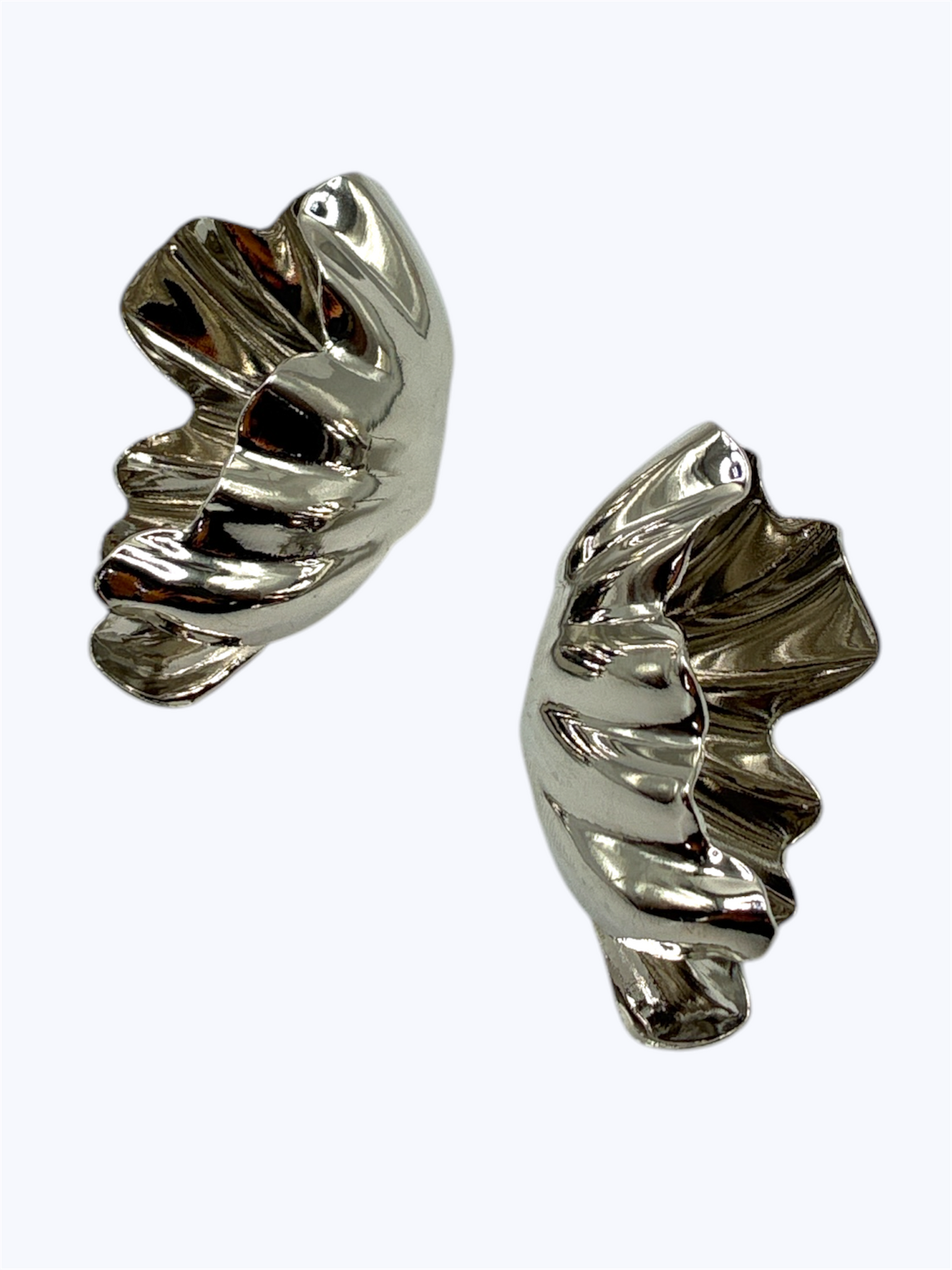 Pair of silver spiral earrings on a white background