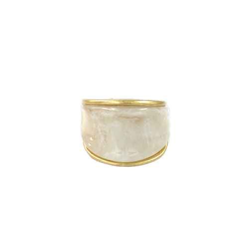 Wide resin band ring with glossy marbled finish and sleek metallic trim in a modern minimalist design.