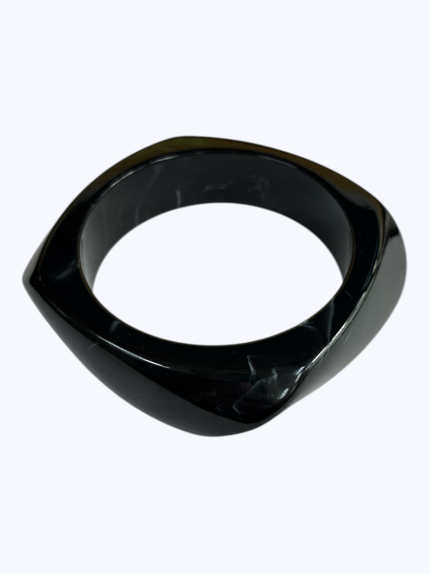 Minimalist marbled resin bangle bracelet with rounded square shape and polished glossy finish.