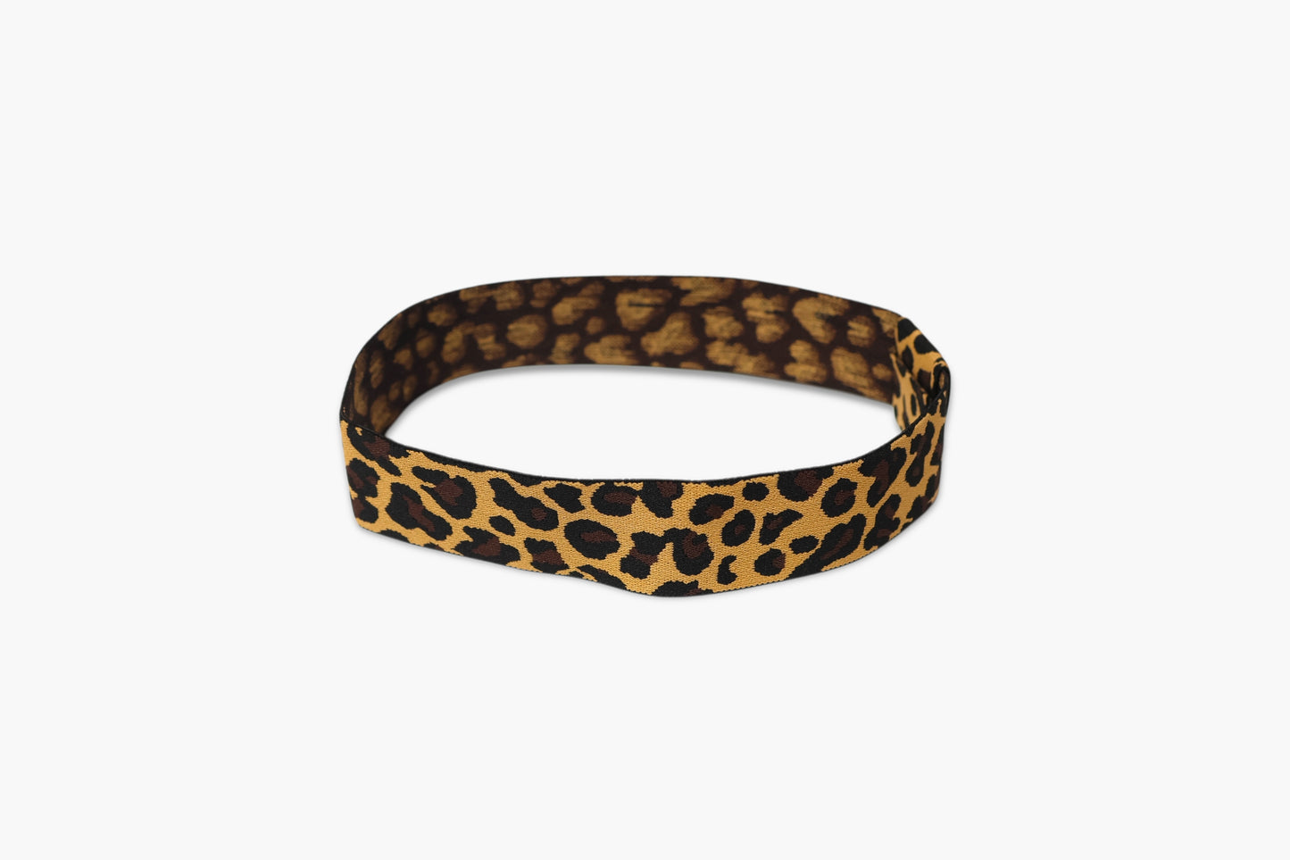 Leopard print headband on a white background