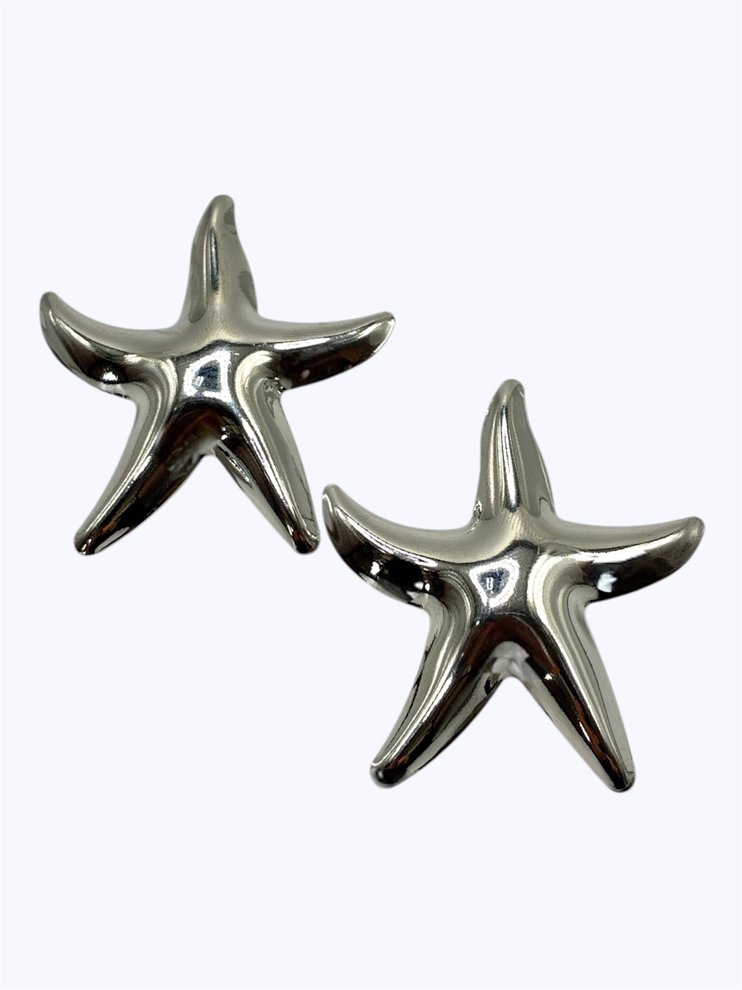 Starfish statement earrings with polished sculptural seaside-inspired design for coastal chic boutique fashion accessories collection