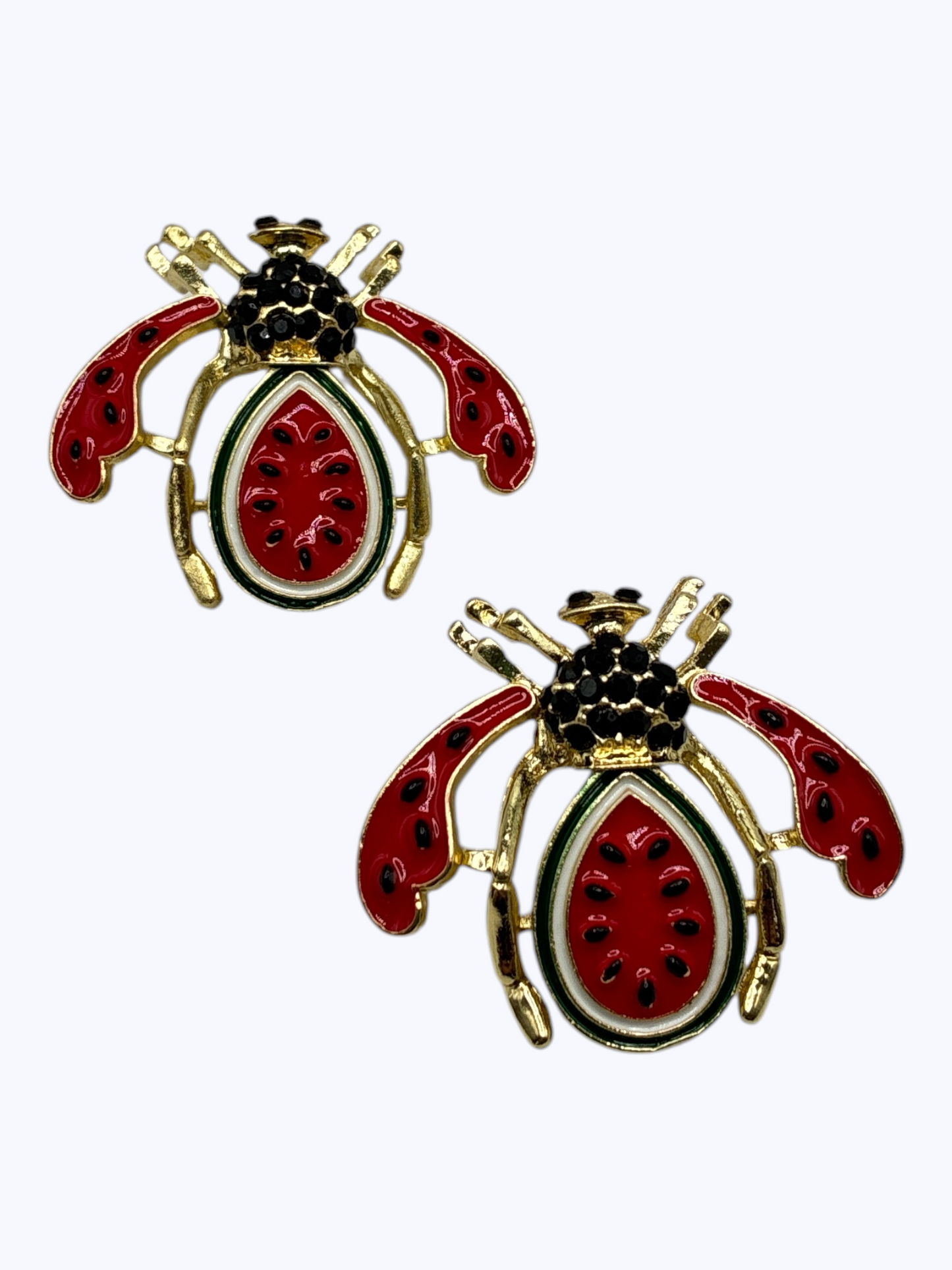 Watermelon-inspired bug statement earrings with red enamel wings, crystal accents, and gold-tone detailing for a playful boutique-inspired look.