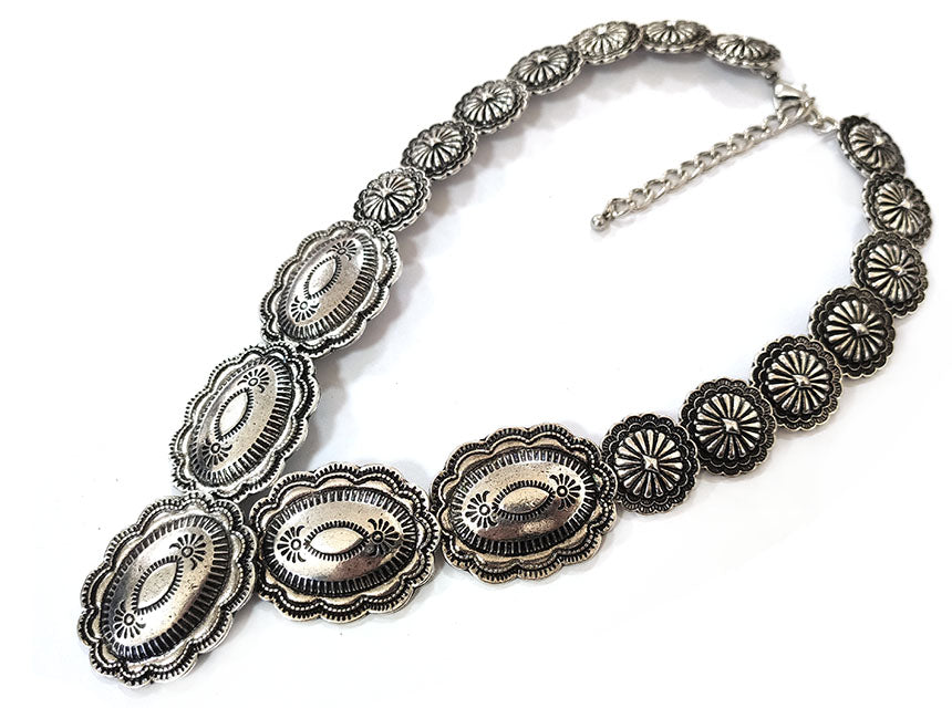 A vintage necklace on a white background