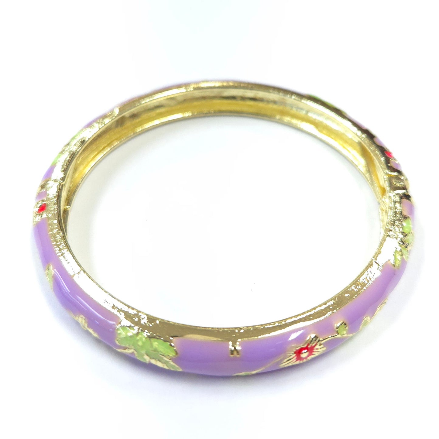 Purple bangle with gold accents on a white background