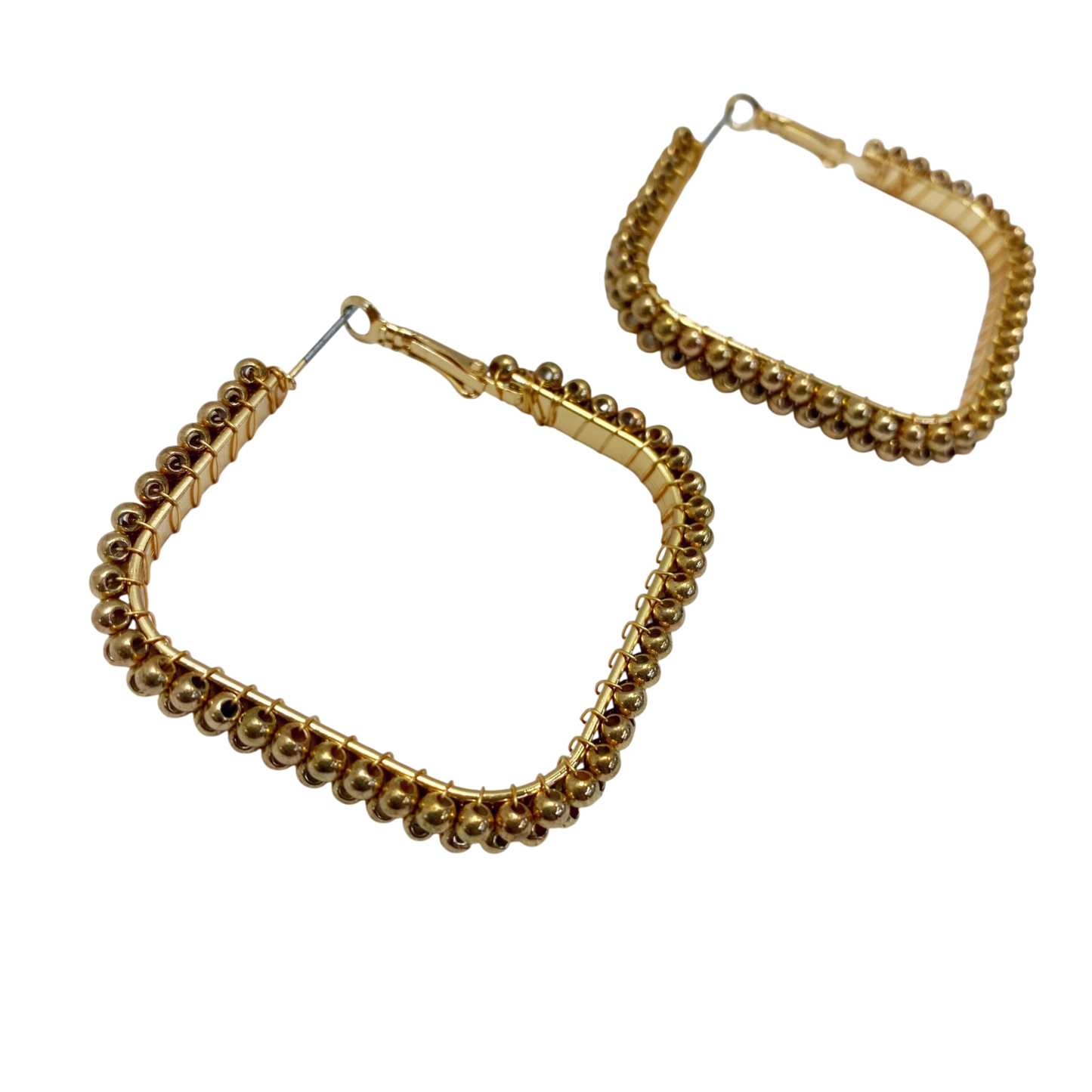 Gold hoop earrings with beaded accents on a white background