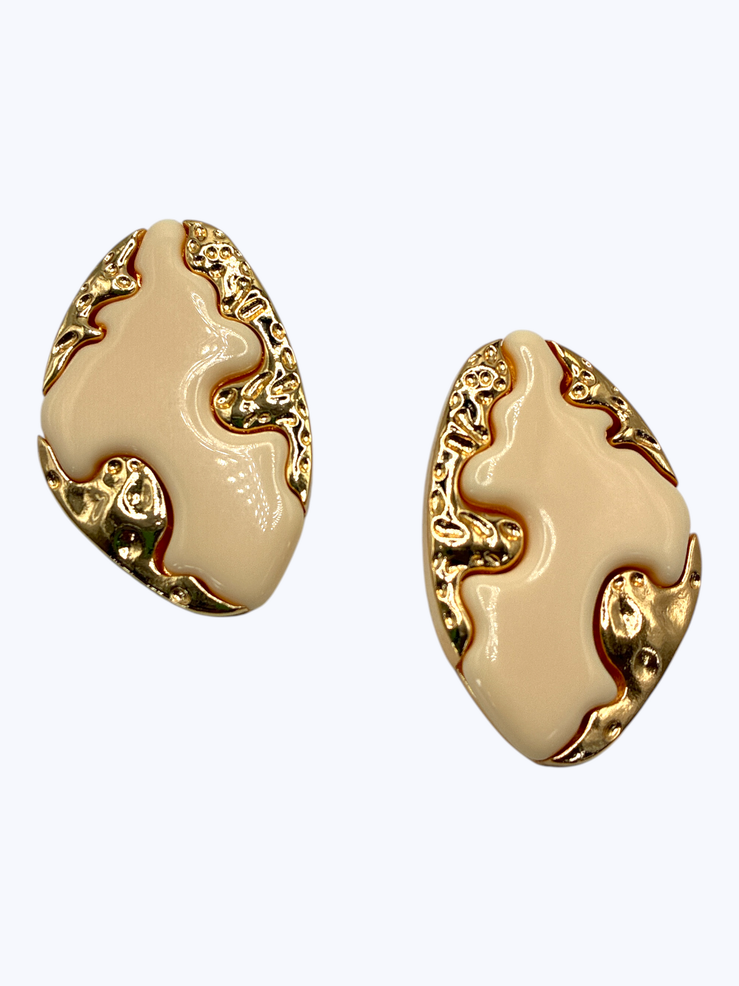 Modern abstract drop earrings featuring sculptural metallic base with bold organic enamel overlay design.