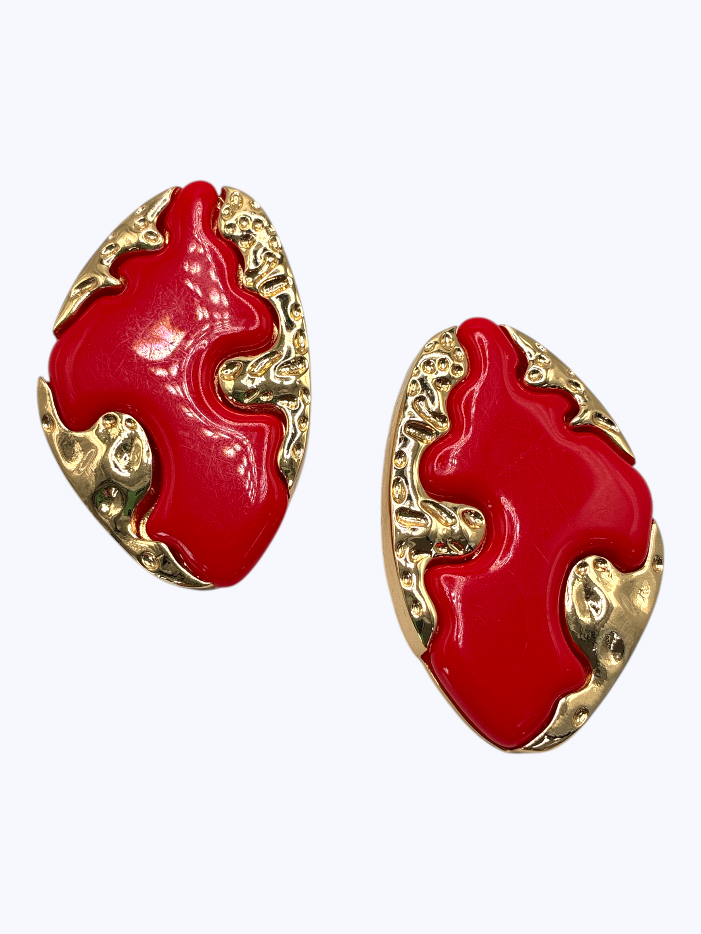 Modern abstract drop earrings featuring sculptural metallic base with bold organic enamel overlay design.