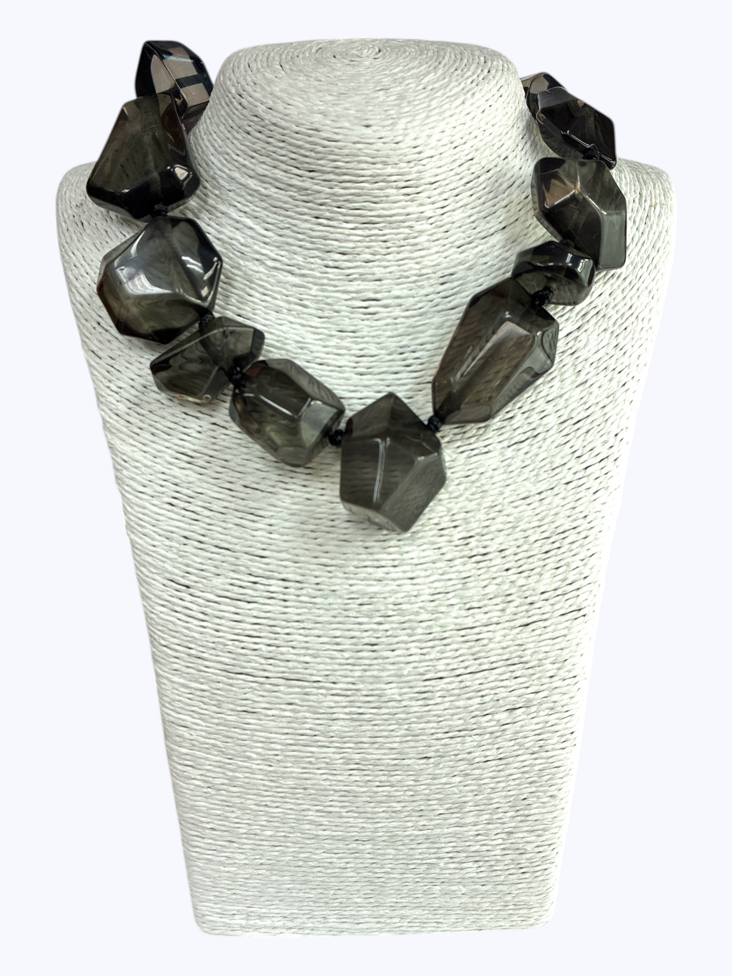 Chunky geometric acrylic necklace featuring oversized translucent faceted beads in a bold modern statement design.