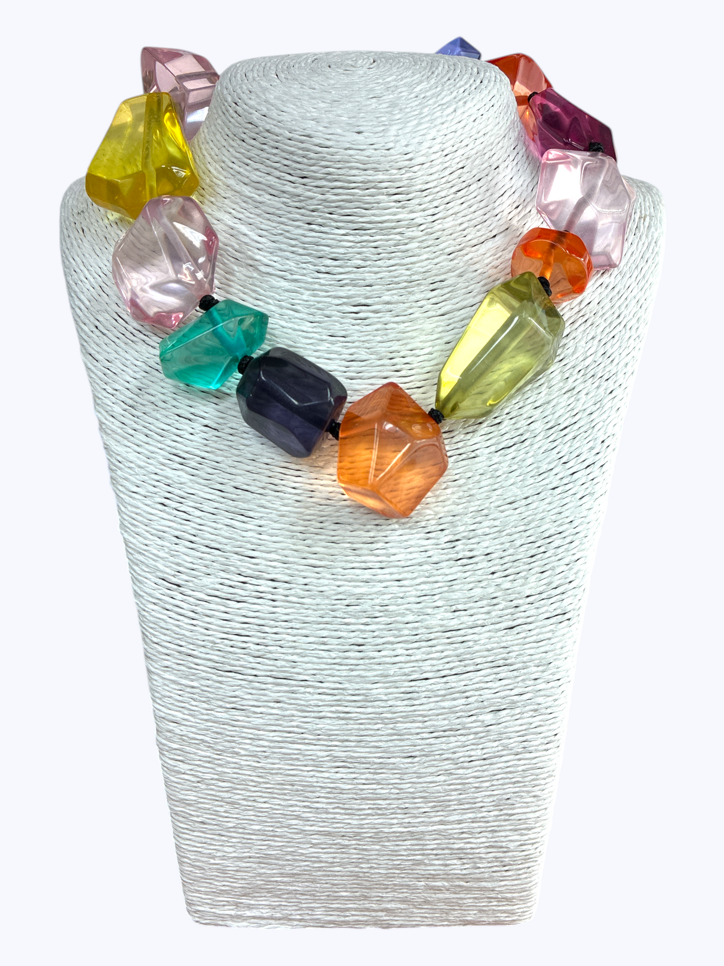 Chunky geometric acrylic necklace featuring oversized translucent faceted beads in a bold modern statement design.