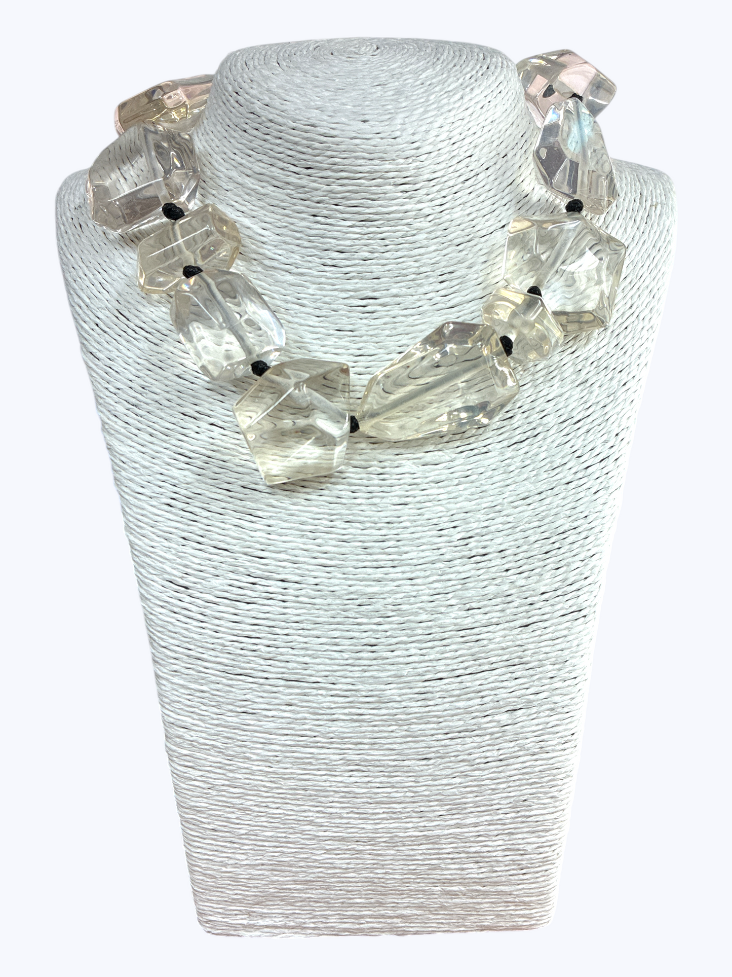 Chunky geometric acrylic necklace featuring oversized translucent faceted beads in a bold modern statement design.