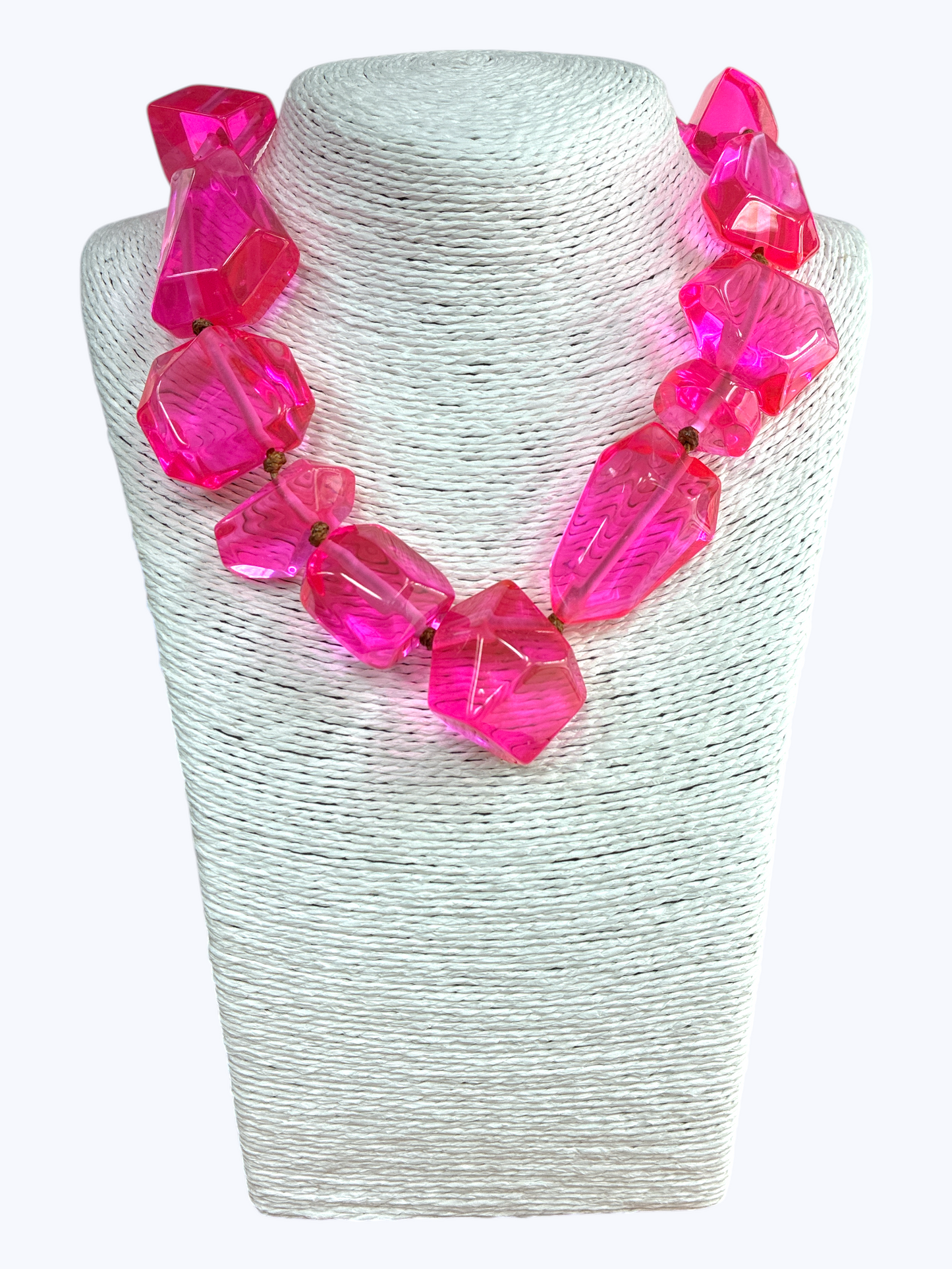 Chunky geometric acrylic necklace featuring oversized translucent faceted beads in a bold modern statement design.