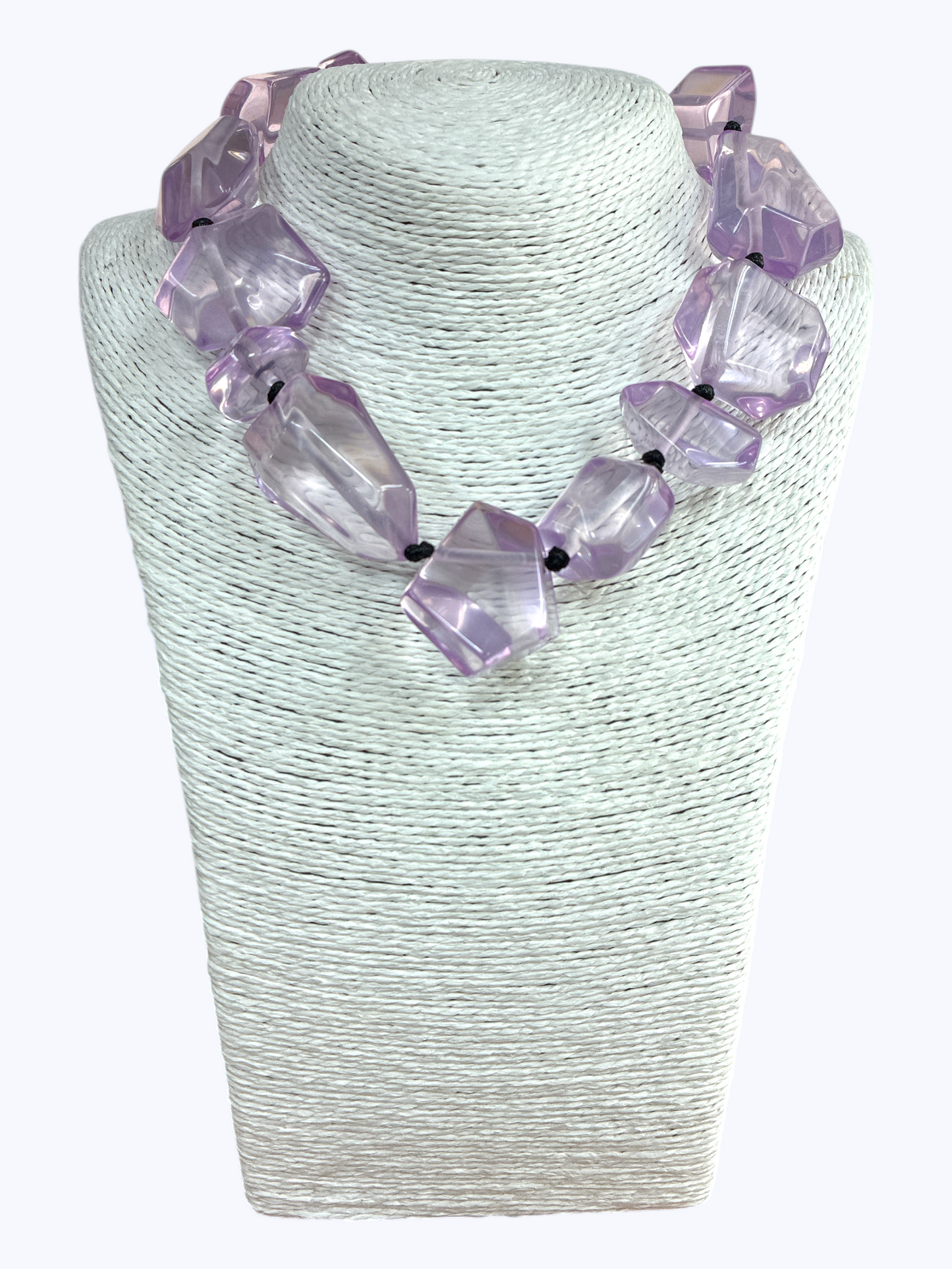 Chunky geometric acrylic necklace featuring oversized translucent faceted beads in a bold modern statement design.