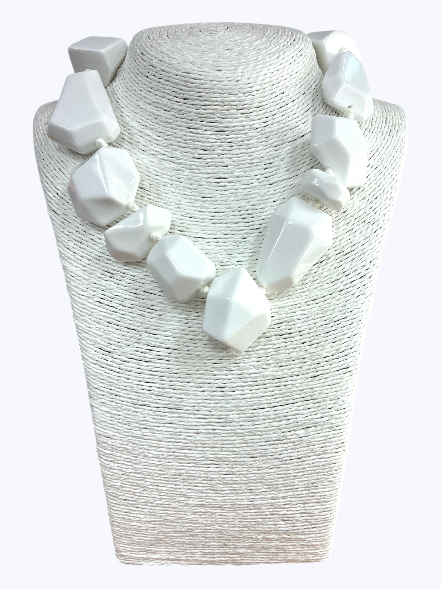 Chunky geometric acrylic necklace featuring oversized translucent faceted beads in a bold modern statement design.