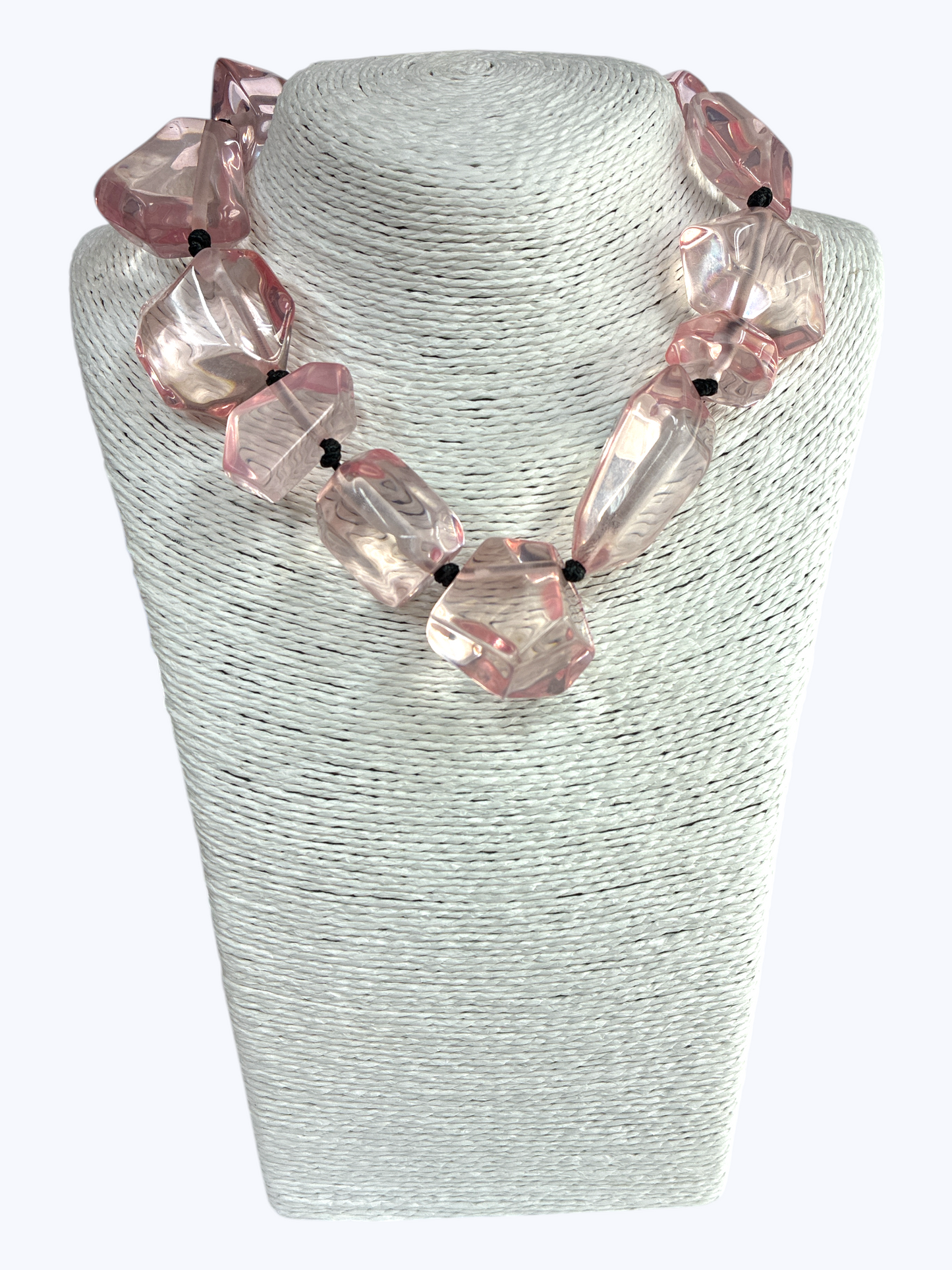 Chunky geometric acrylic necklace featuring oversized translucent faceted beads in a bold modern statement design.