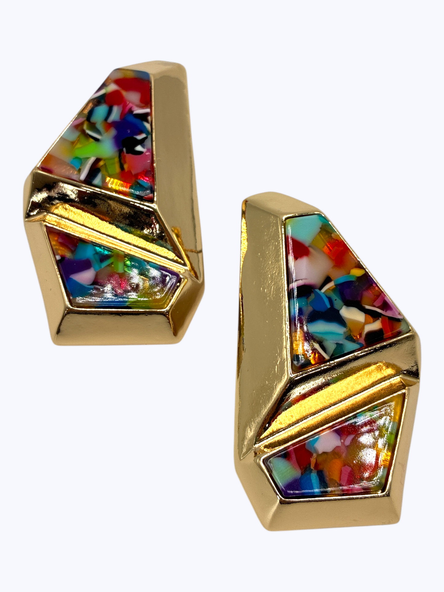 Bold geometric drop earrings featuring abstract multicolor resin mosaic panels framed by sculptural metallic design.