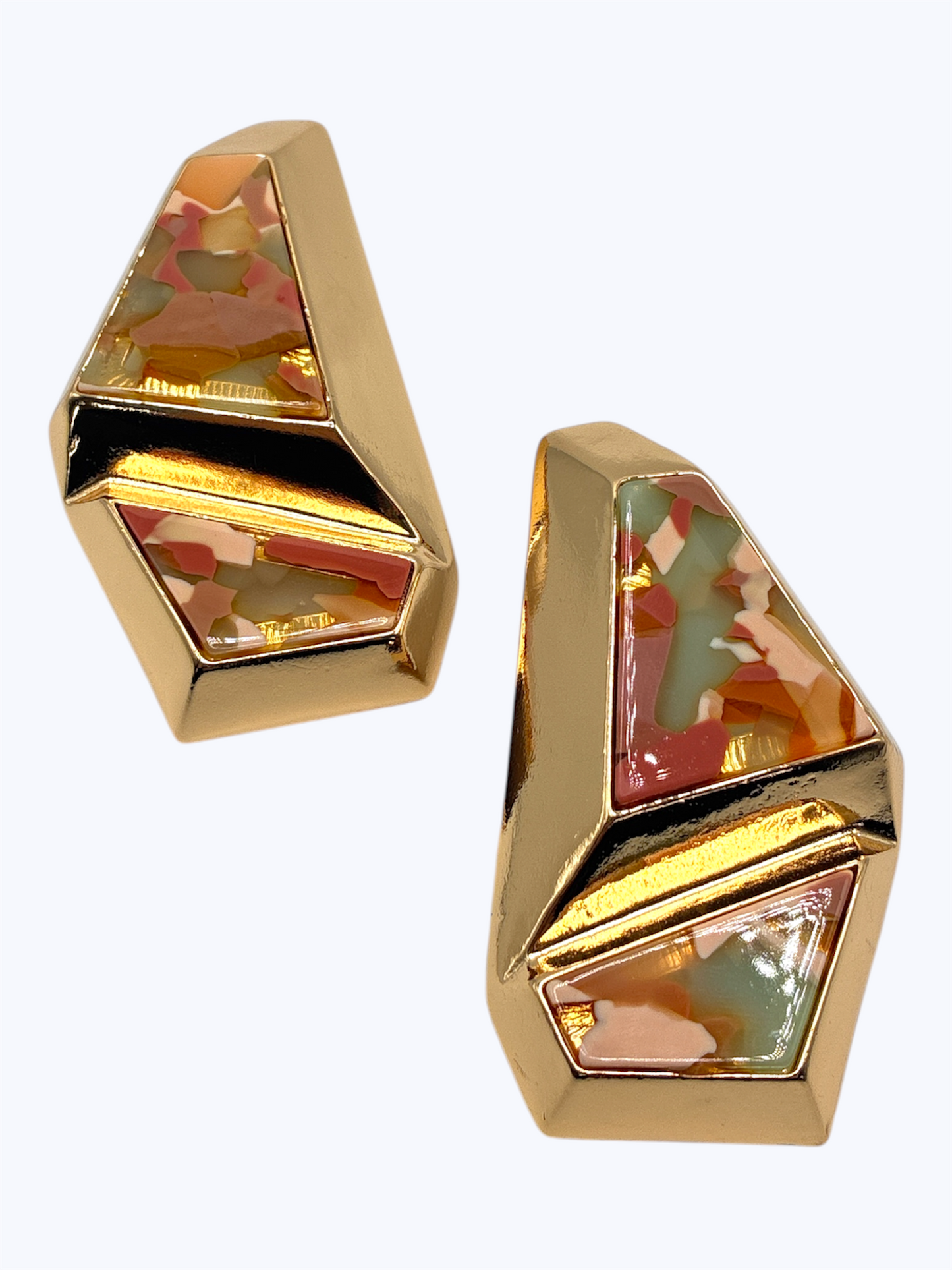 Bold geometric drop earrings featuring abstract multicolor resin mosaic panels framed by sculptural metallic design.