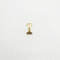 Gold letter 'I' charm on a white background