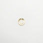 Gold ring on a white background