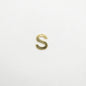 Gold letter 'S' charm on a white background