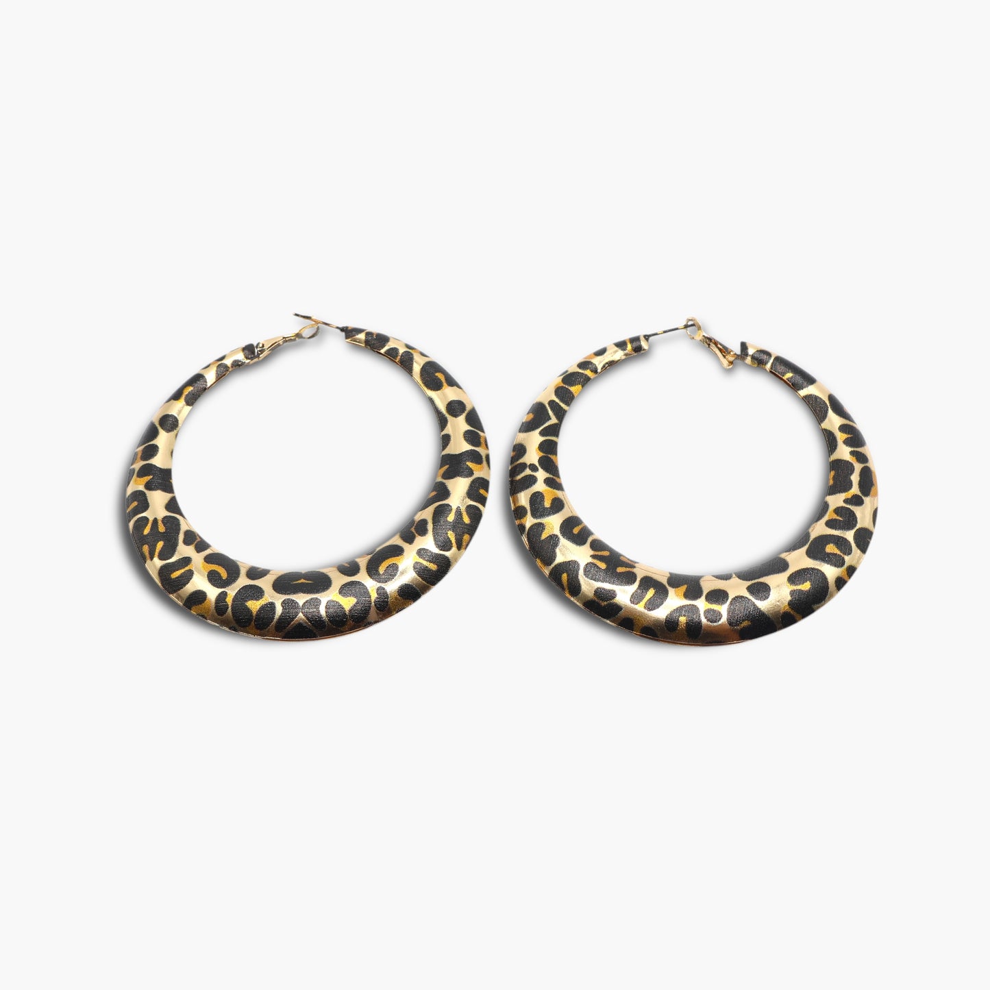 A pair of round hoop earrings with a leopard animal print pattern in gold and black colors.