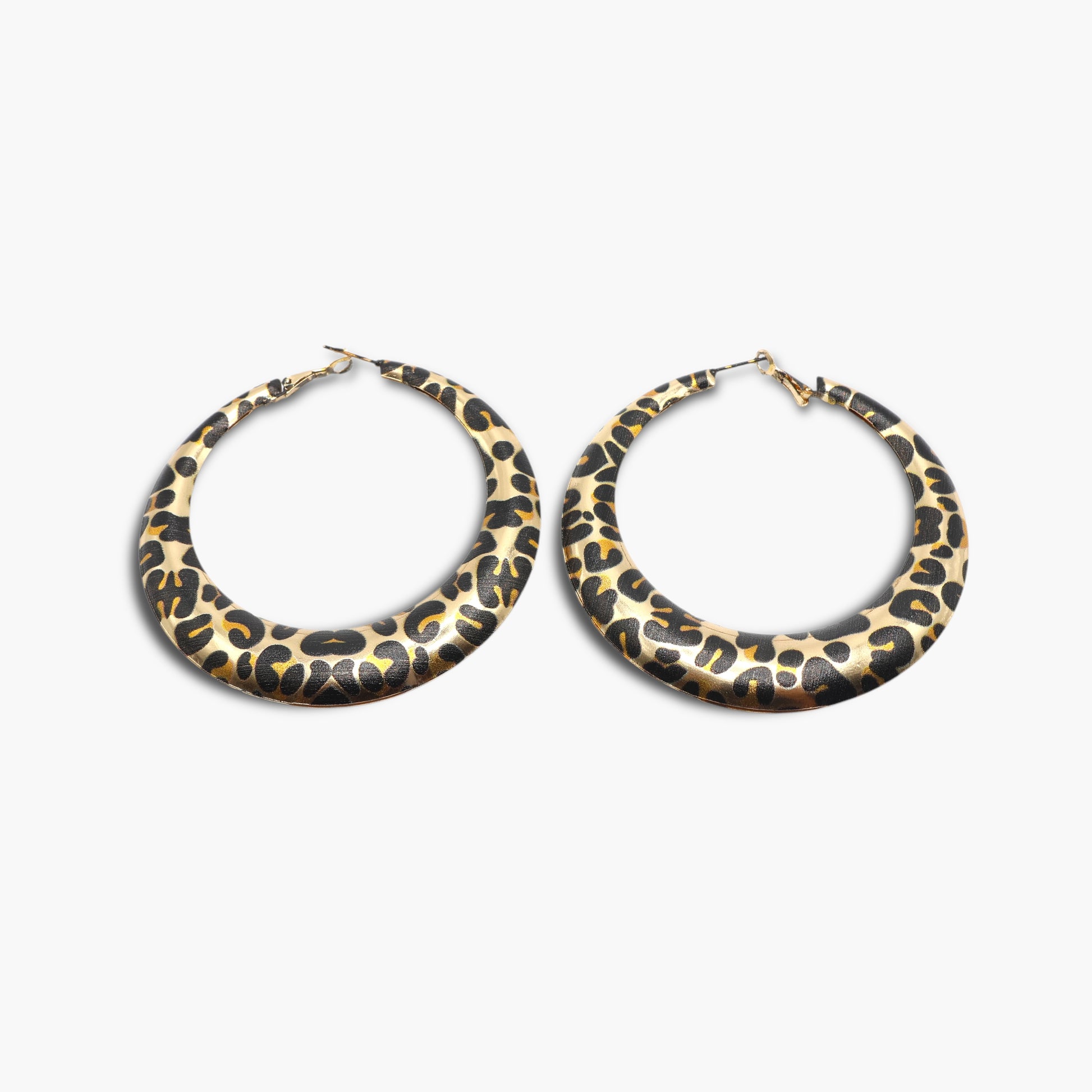 A pair of round hoop earrings with a leopard animal print pattern in gold and black colors.