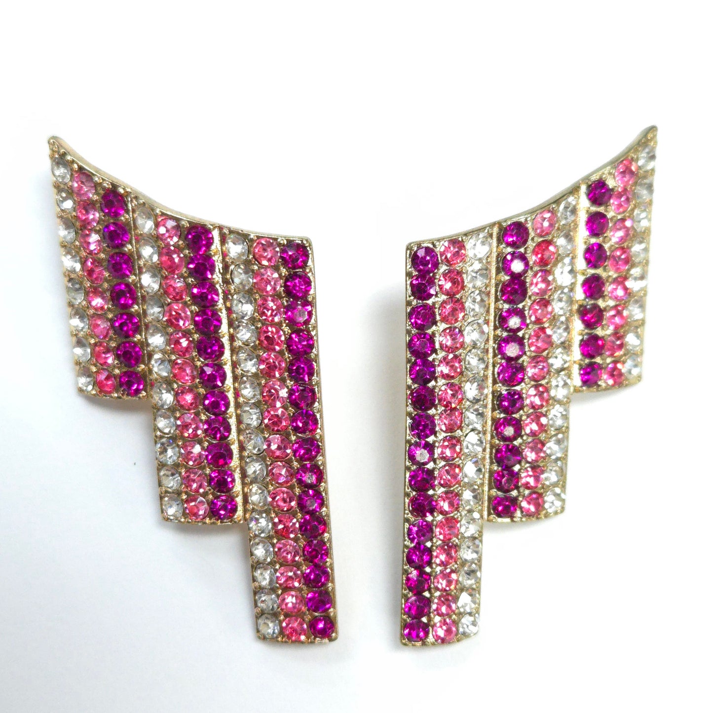 Pair of earrings with pink and purple gemstones on a white background