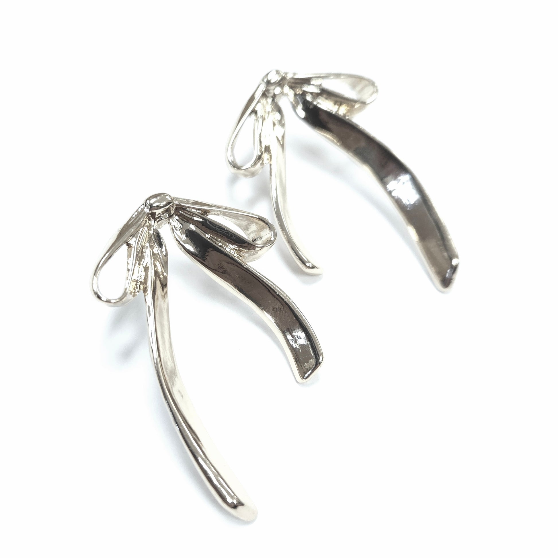 Silver wishbone-shaped earrings on a white background