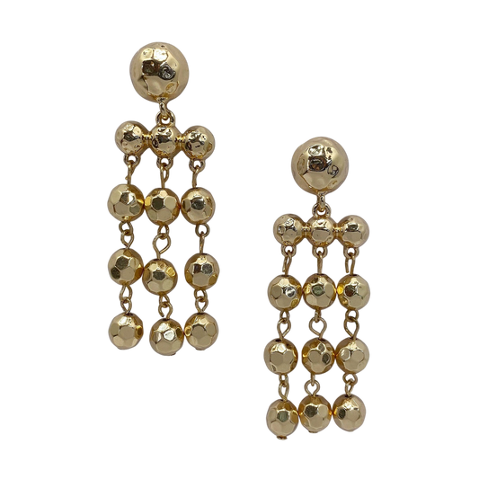 Gold beaded earrings on a white background