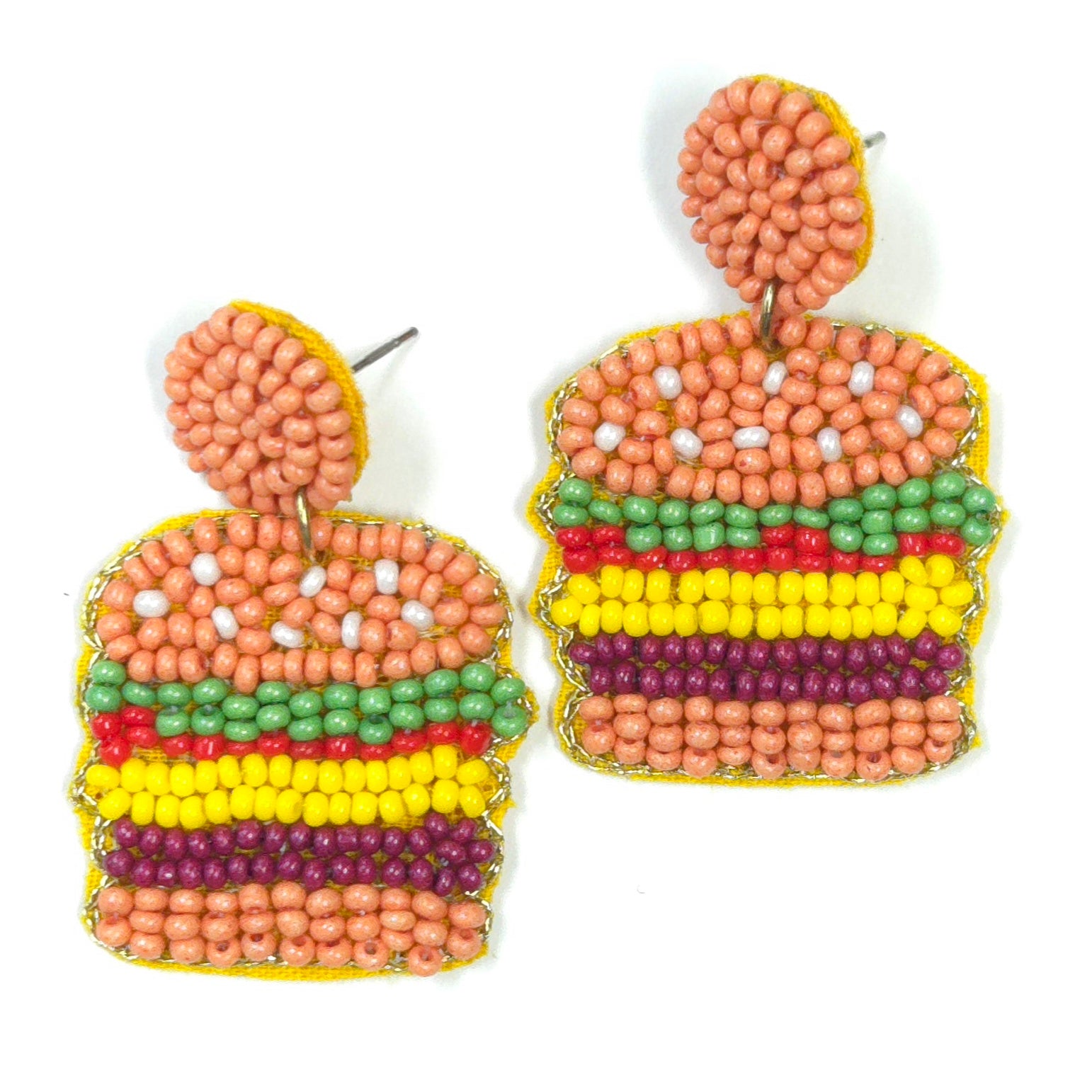 Colorful beaded earrings on a white background