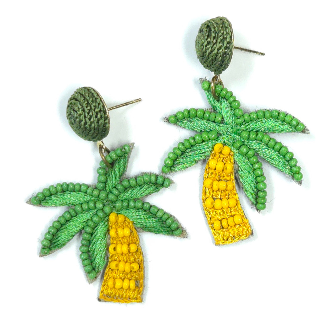 Palm tree and corn earrings on a white background