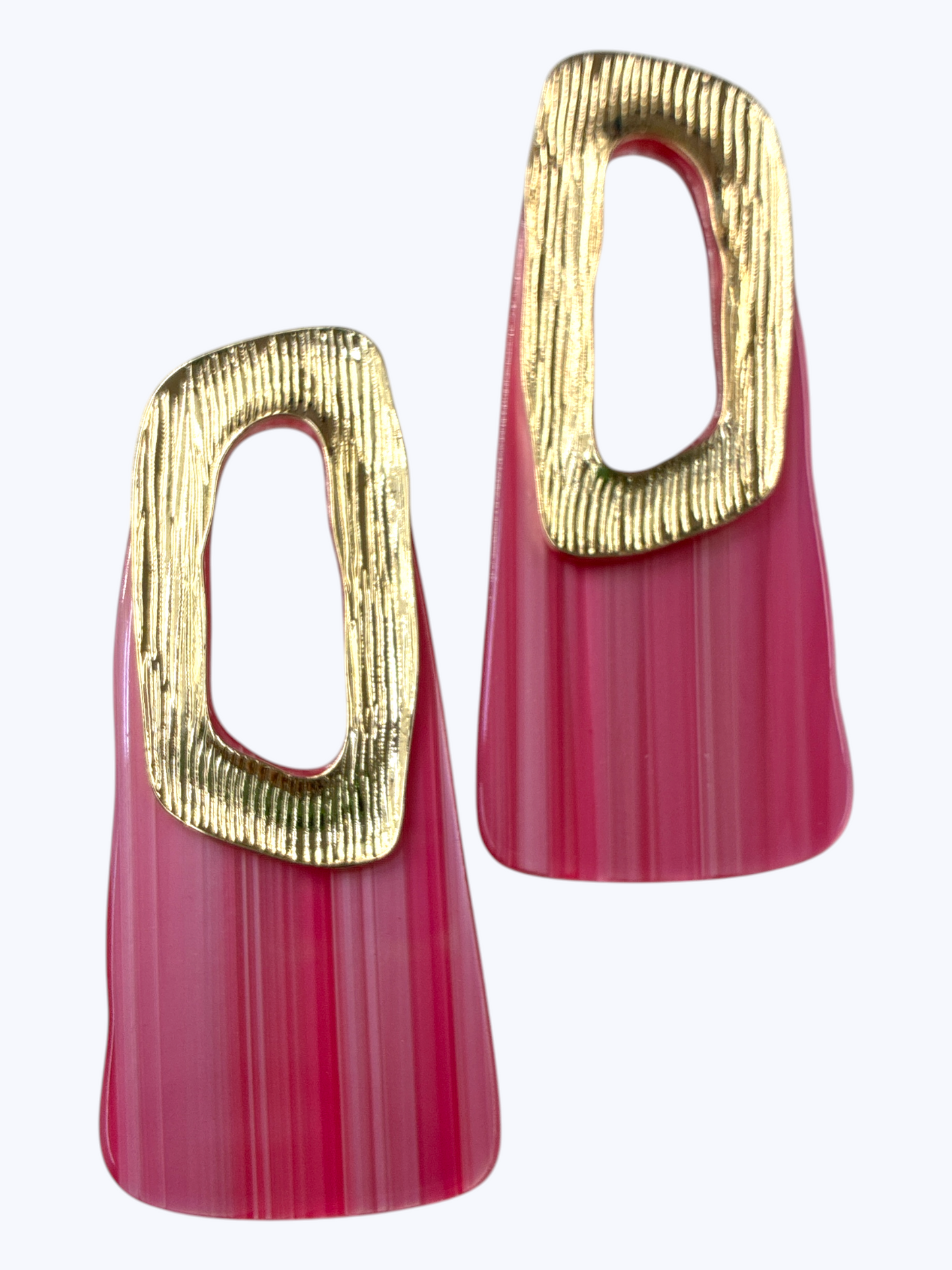 Modern geometric drop earrings featuring ribbed resin panel design with abstract metallic open-frame accent.