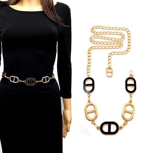 Gold and black belt with chain on a mannequin and white background