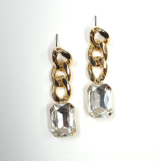 Gold chain earrings with clear crystal drops on a white background