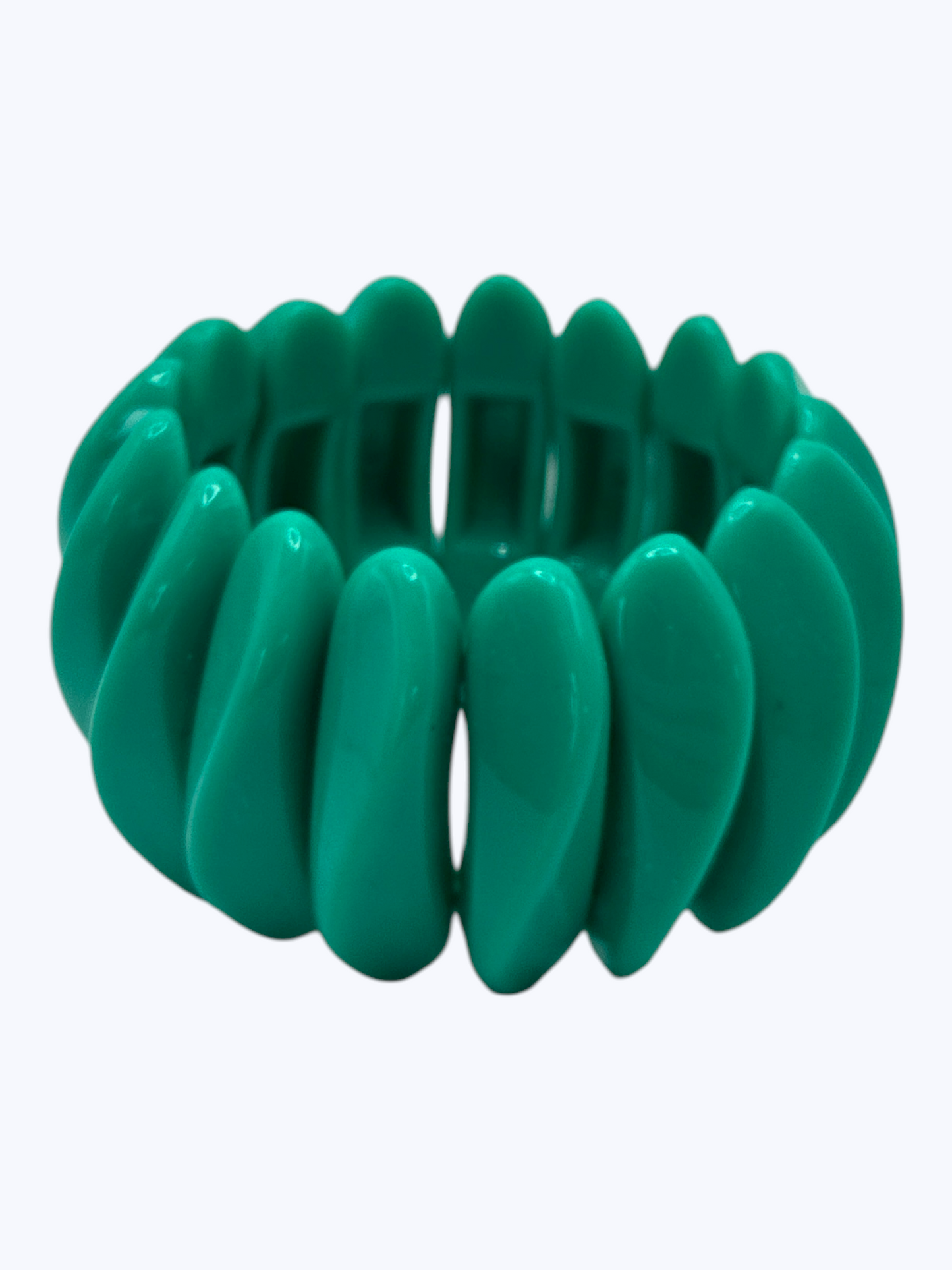 Chunky teal stretch bracelet with glossy oversized resin links for a bold contemporary boutique statement look.