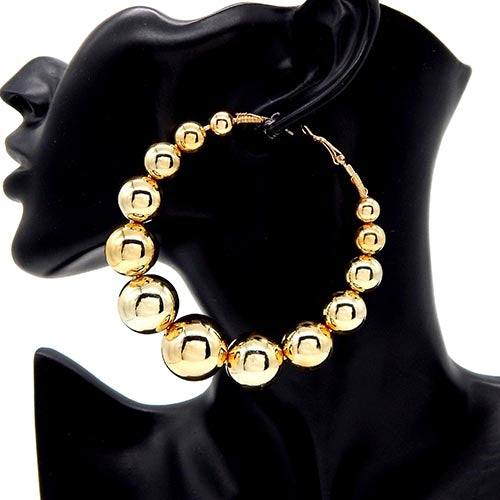 Large hoop earrings with graduated polished ball beads on a mannequin ear display