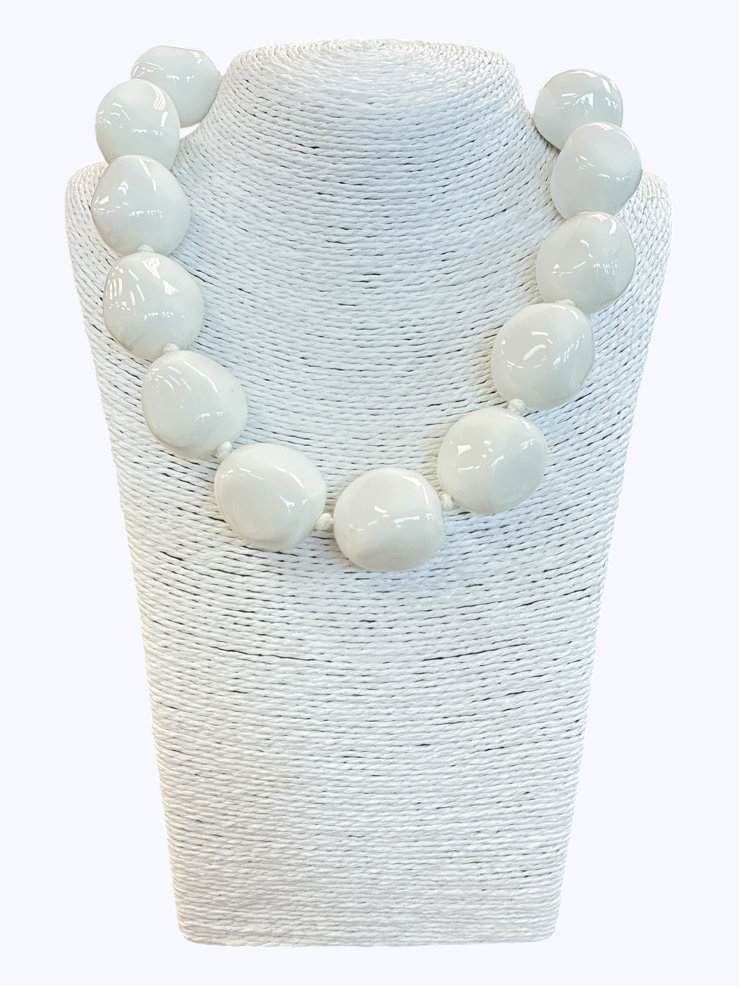 Chunky white statement necklace with oversized glossy resin beads for a chic modern boutique-inspired style.