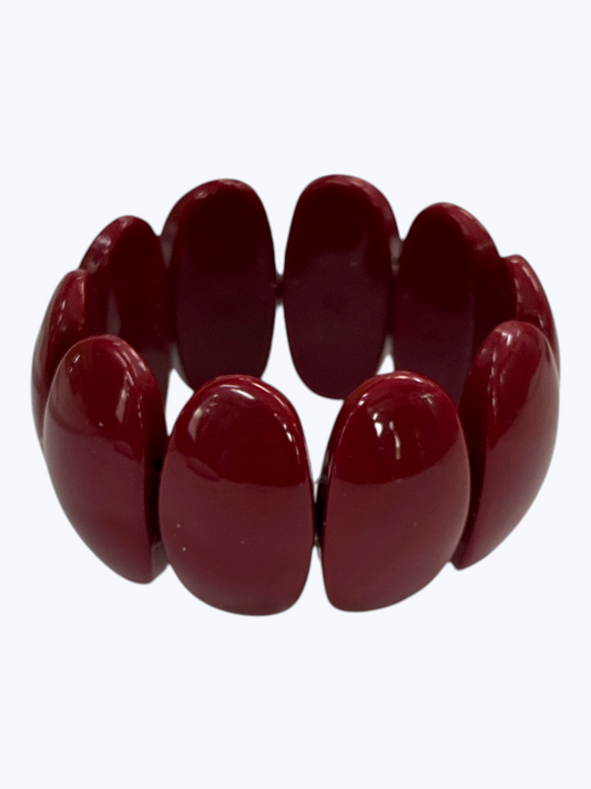 Chunky burgundy stretch bracelet with glossy oversized resin links for a bold modern boutique statement look.