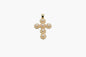 Gold cross pendant with pearls on a white background